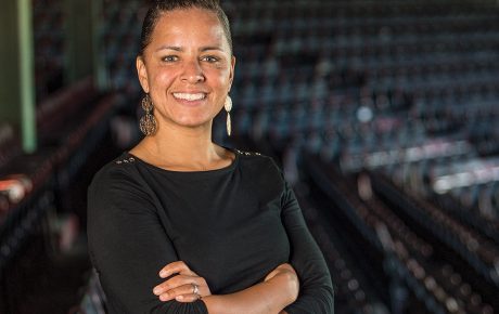 Photograph of Rebekah Splaine Salwasser ’01 standing in the Boston Red Sox stadium